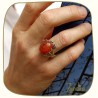 Pierre orange de cornaline sur bague monture argent